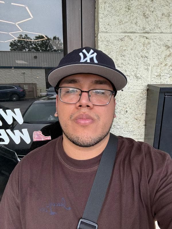 Dennys - barber at The Dominicans Barbershop